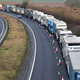 Trucks are seen queuing in the A259 road during a test drive to the Port of Dover.